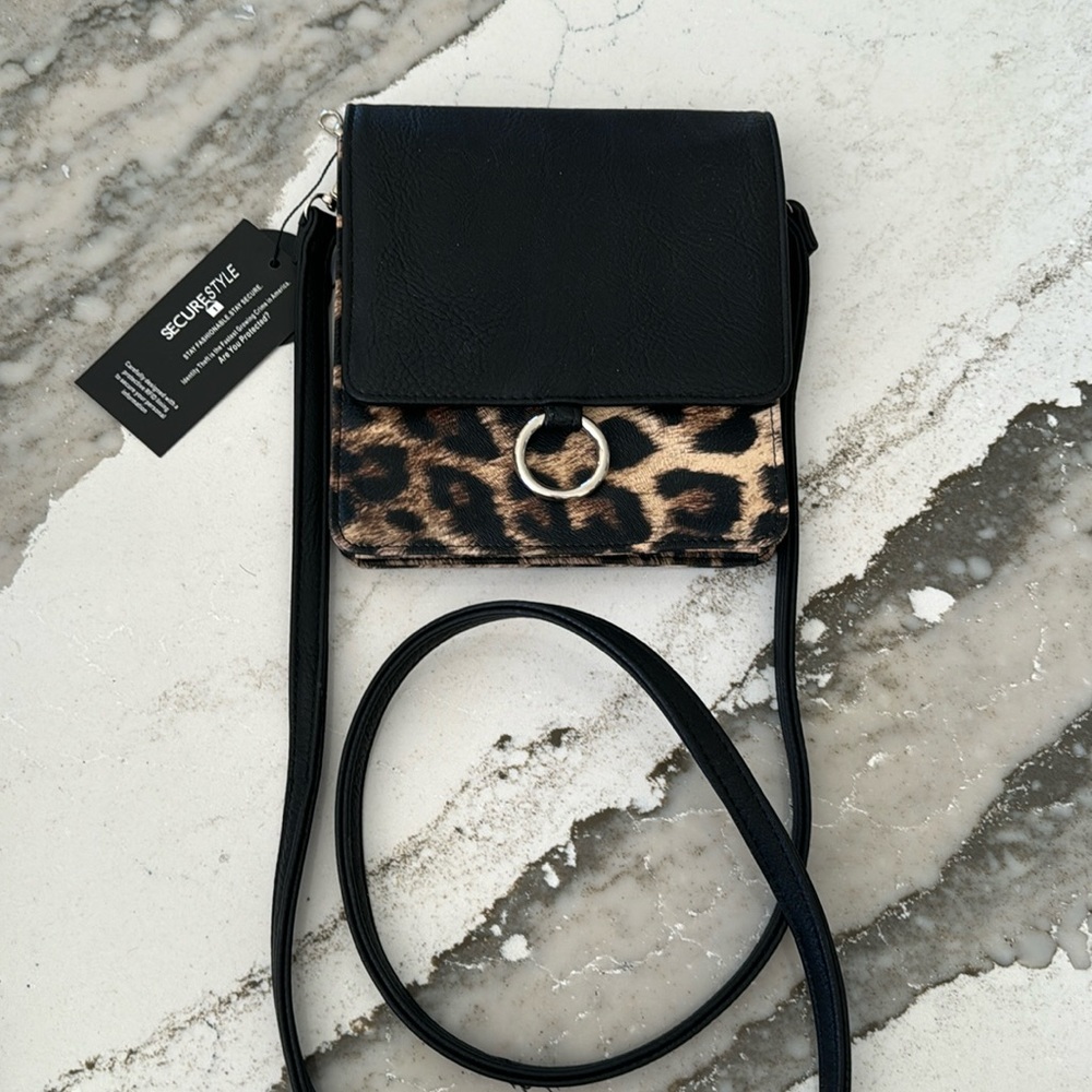 k Carroll over the shoulder bag.  New with tags